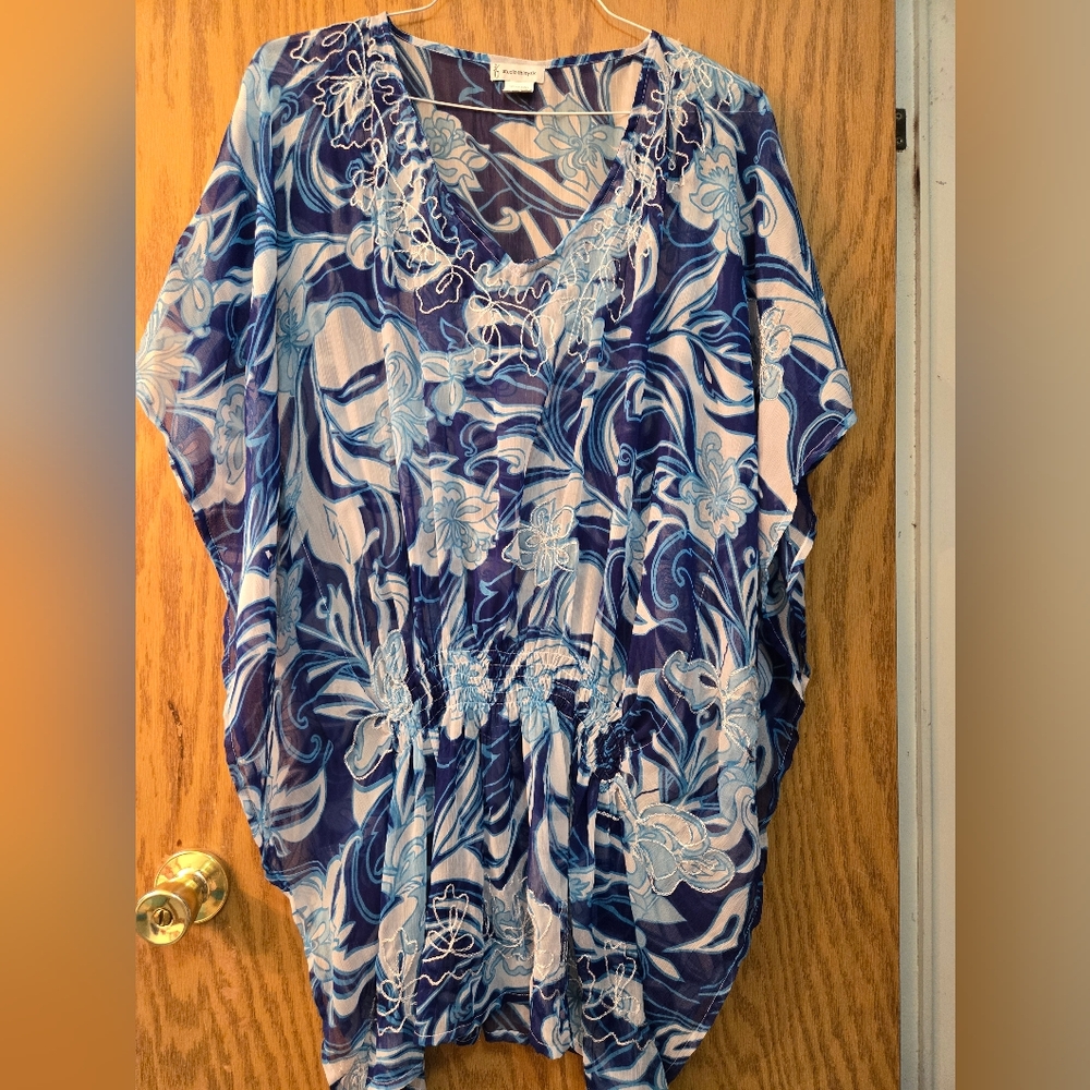 Beautiful dark blue, turquoise and white sheer swimsuit cover up.